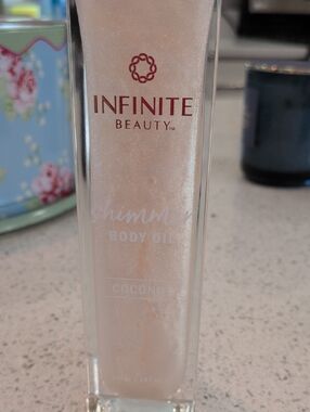 INFINITE BEAUTY Shimmer Body Oil - COCONUT Pearl